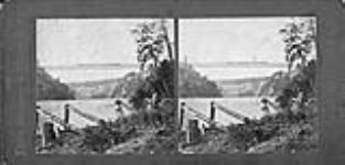 The Niagara Suspension Bridge taken from the river bank 1859.