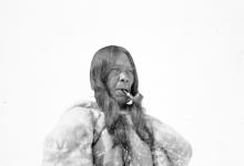Inuk woman smoking a pipe 1926