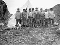 Group of Inuit in front of a tent [between 1918 and 1920].