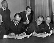 [Paul Martin Sr. signing document] November 1963.