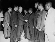 [Lester B. Pearson with D.B. Sangster, acting Prime Minister of Jamaica, meeting Jamaican officials] November, 1965.
