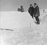 J.C.Jackson and Arctic Wings mechanic inspect the job 1953