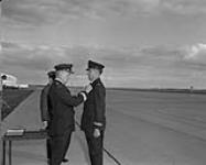 B/General C.H. Mussels presents wings to Lt. R.H. Tomyk of Stonewall, Manitoba June 18, 1970.