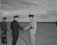 B/General C.H. Mussells presents trophy to Capt. D.E. Cavannagh June 18, 1970.