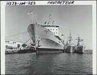 [HMCS PROTECTEUR AOR-509 replenishment oiler in port] 1973