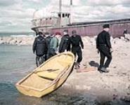 Beaching plastic ice boat at Coral Harbour (also image number LAB 884) June, 1955
