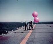 Releasing Balloon from HMCS MAGNIFICENT 1952
