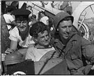 Left to right, A/B Leslie Pyle, Toronto; Sto. Rocky Mellway, Toronto; Sgt. Jim Dunsford, Toronto August 22, 1944.