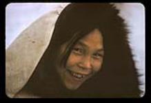 Portrait of Inuit artist [Napatchie Pootoogook], Cape Dorset, Nunavut [between August 24-October 3, 1960].