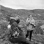 [Rosemary Gilliat Eaton (left), Bill Larmour and Barbara Hinds (right) outdoors] [between 1956-1960]