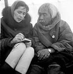 [Alma Houston (left) and Kingwatsiak (right), Kinngait, Nunavut] [between 1956-1960]