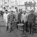 [Men standing on a boat, Iqaluit, Nunavut] [between 1956-1960]