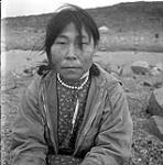 [Sheouak Petaulassie posing outdoors, Kinngait, Nunavut] [between 1956-1960]