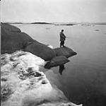[Man fishing] [between 1956-1960]