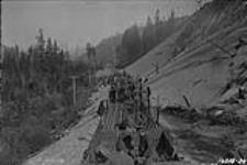 [Gang of workers Installing railway tracks in the Rocky Mountains] 1914