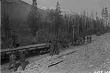 [Gang of workers Installing railway tracks in the Rocky Mountains] 1914