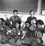 [Brownies and their leaders playing a game, Iqaluit, Nunavut] 1960