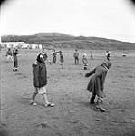 [Children playing outside, Iqaluit, Nunavut] 1960