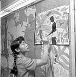 [Young girl painting, Iqaluit, Nunavut] 1960