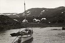 [Sailboat anchored near the shore, Killiniq, Nunavut] 1960