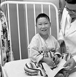 [Young boy smiling at Charles Camsell Hospital, Edmonton, Alberta] [between 1956-1960]