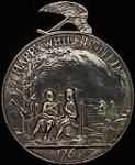 Médaille Happy While United (Heureux tant qu'ils seront unis) à l'effigie de George III, remise à des chefs amérindiens en gage de paix 1764.