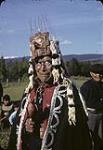 First Nation Elder in ceremonial clothing [Aîné des Premieres Nations en vêtements de cérémonie] [entre 1942 et 1959].