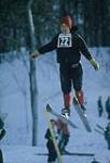 Midget jumper in mid-air. Camp Fortune, Gatineau Park février 1964