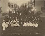 Group portrait, church choir and organ. Including a young Sir Ernest MacMillan. Probably St. Enoch's 1905