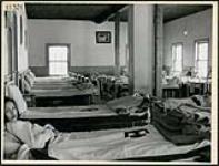 Girl in the girl's dormitory of the Anglican Indian Missionary School at Lac la Ronge, Saskatchewan March 1945