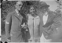 Wilson P. MacDonald and C.G.D. Roberts with a woman [1926]