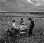 Supper beside English River, Ontario August 3, 1954.