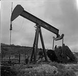 Helen Salkeld and Audrey James at Turner Valley Oil Field, Alberta August 12, 1954.