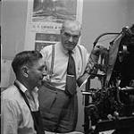 Gerhard S. Derksen and a linotype operator, Steinbach, Manitoba June 2, 1956.