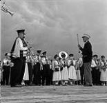 Members of a marching band performing during the Swan River round-up, Manitoba June 30, 1956.