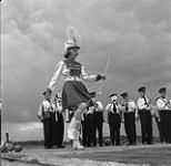 Majorette performing during the Swan River round-up, Manitoba June 30, 1956.