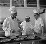 Teacher Mr. J.G. Cartwright, student Unahah and Jack Dubnicoff, Manitoba Technical Institute, Winnipeg [ca 1954-1963].
