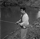 Man fishing, Kitimat, British Columbia June 17, 1956.