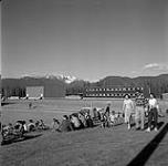 People watching Kitimat Cadet Corps' first annual inspection parade, British Columbia June 12, 1956.