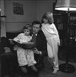 Man Reading To Children, Piper Family [ca1954-1963]