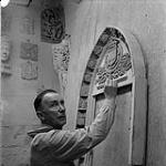 William Oosterhoff with sculpture [ca 1954-1963].