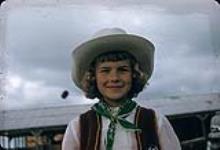 Cowgirl au rassemblement de bétail de Swan River, Manitoba 30 juin 1956.