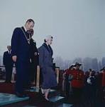 H.M. Queen Elizabeth II and Ottawa Mayor George Nelms. Landsdowne Park. Ottawa, Ont. October 16, 1957.