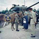 H.R.H. Princess Margaret inspecting the Canadian Hussars, Princess Louise's 2nd regiment of the Royal Canadian Horse Artillery at Camp Gagetown, N.B.  [Entre juillet et août 1958].