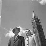 Senator James Gladstone with his wife Janie in front of the Peace Tower, Ottawa 1958