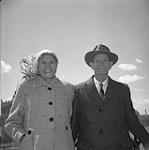 Senator James Gladstone with his wife Janie behind the Parliament, Ottawa 1958