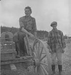 Gaspé 1951, (5) two men with a wagon 1951