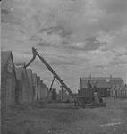 Saskatoon & Wheat, farmers working [between 1939-1951].