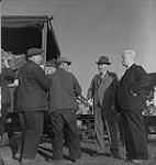 Vancouver. J. Lyle Telford and an Unidentified Man in a Suit talking to Vendors [between 1939-1951]