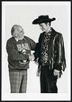 Sam Sniderman shaking the hand of Stompin' Tom Connors [between 1990-2000]